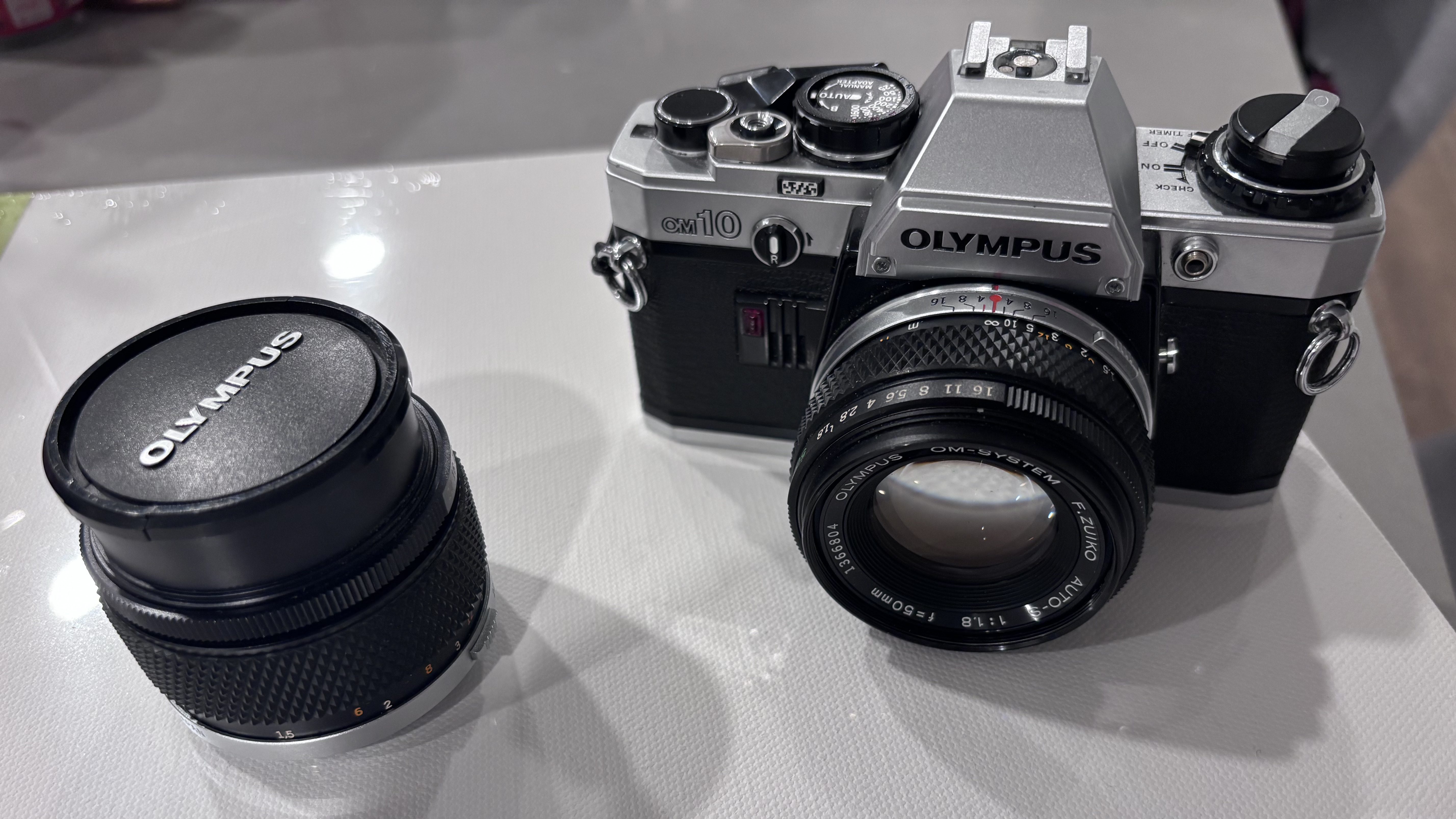 OM10 w/50mm on and 100MM to left